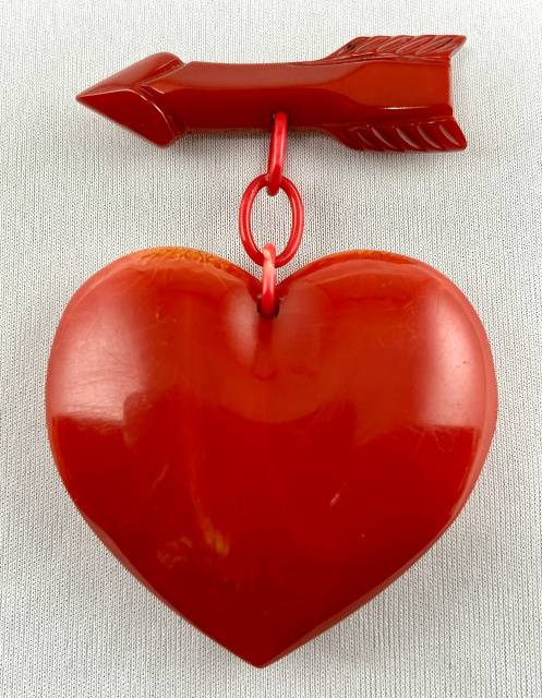 BP250 puffy red bakelite heart brooch pin